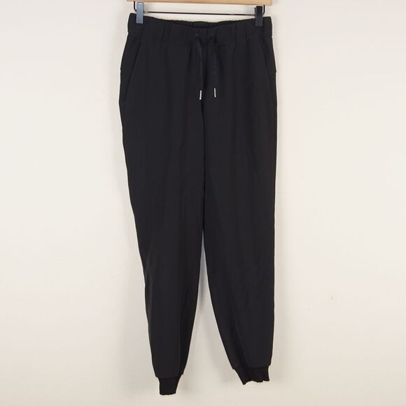Lululemon On The Fly Jogger Woven Black Pants Womens Sz 4 - Picture 1 of 10